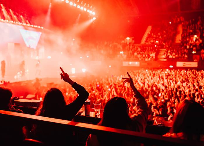 Fans watch concert at Wembley Arena