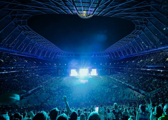 Fans watching concert at Tottenham Hotspur Stadium