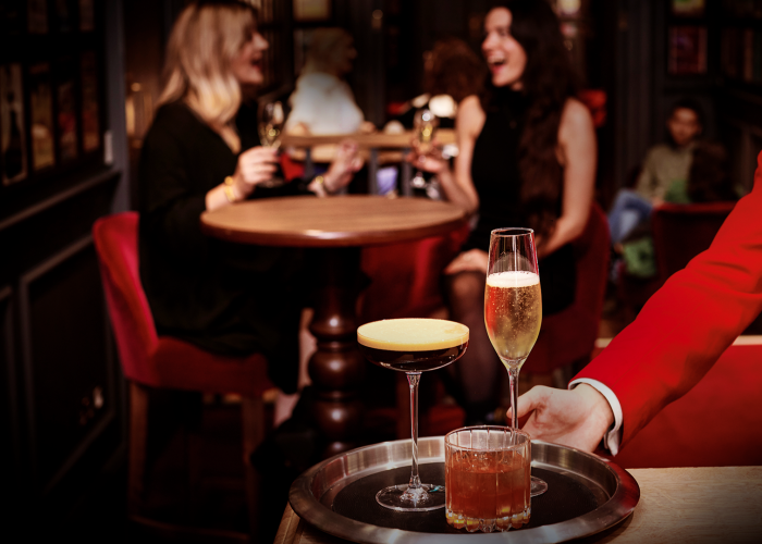 Red Coat Butler serving cocktails and champagne