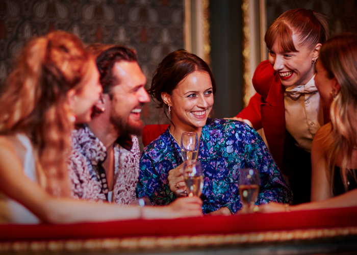 Guests enjoying champagne at The London Palladium