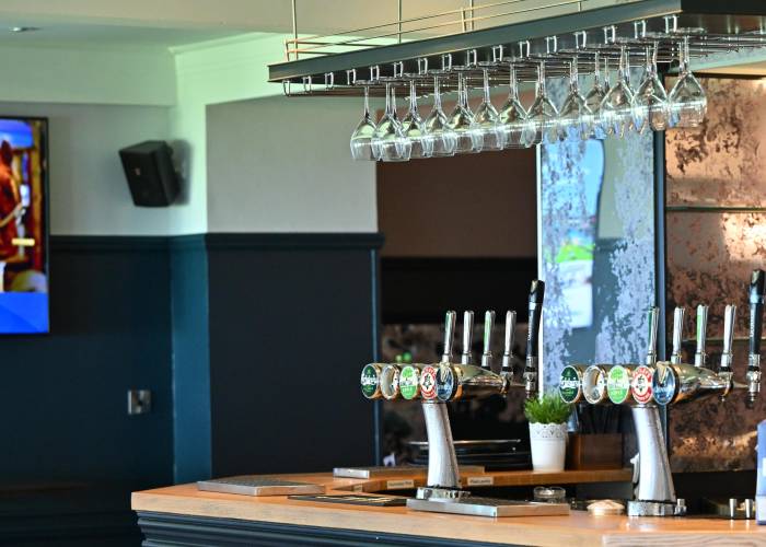 Bar with hanging wine glasses