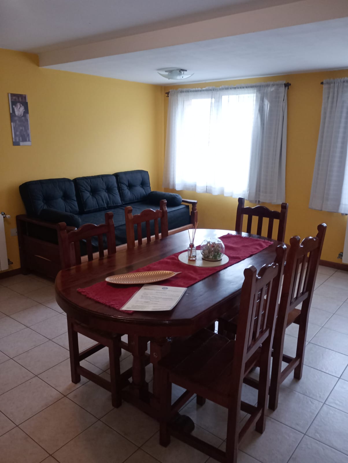Comedor y living del departamento