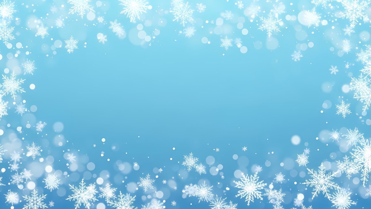 Elegant winter background featuring white snowflakes and soft bokeh lights framing a clear blue space.