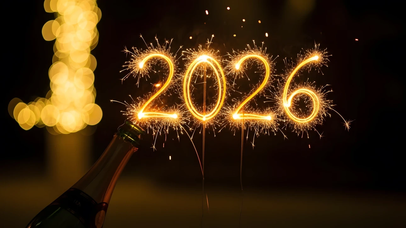 Celebrate the New Year with this festive image featuring sparkling '2026' numerals. A premium design asset, perfect for holiday promotions and greetings.