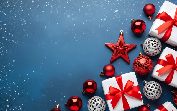 Download this stunning festive background featuring red Christmas ornaments, gift boxes, and falling snow on a deep blue surface.