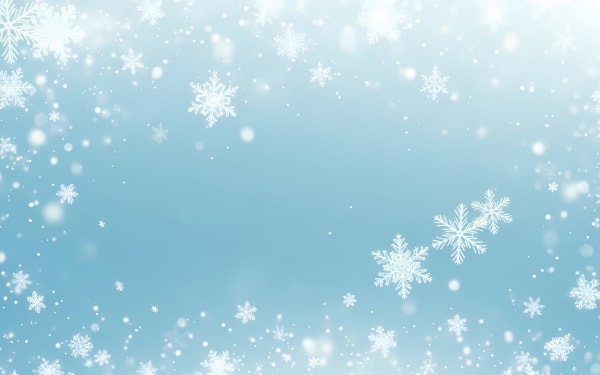 Download this elegant winter background featuring white falling snowflakes and bokeh lights on a soft blue gradient. Perfect for holiday designs.