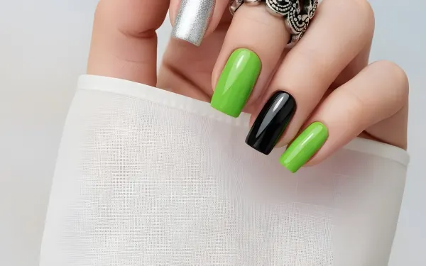 Elevate your designs with this hand showcasing a trendy manicure and statement ring. Perfect for high-fashion beauty and lifestyle campaigns.