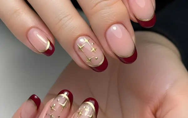 Elevate your designs with this image of manicured hands featuring burgundy and gold nail art. Perfect for beauty blogs and salon promotions, ready for commercial use.