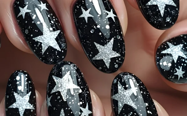 Elevate your style with this nail art featuring silver stars on a glossy black background. Perfect for adding a touch of celestial charm to any look.