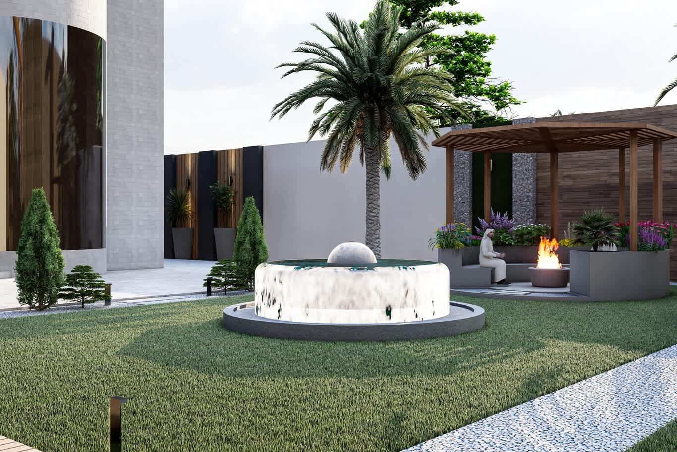 Garden fountain on a lawn with a fire pit seating area under a timber pergola