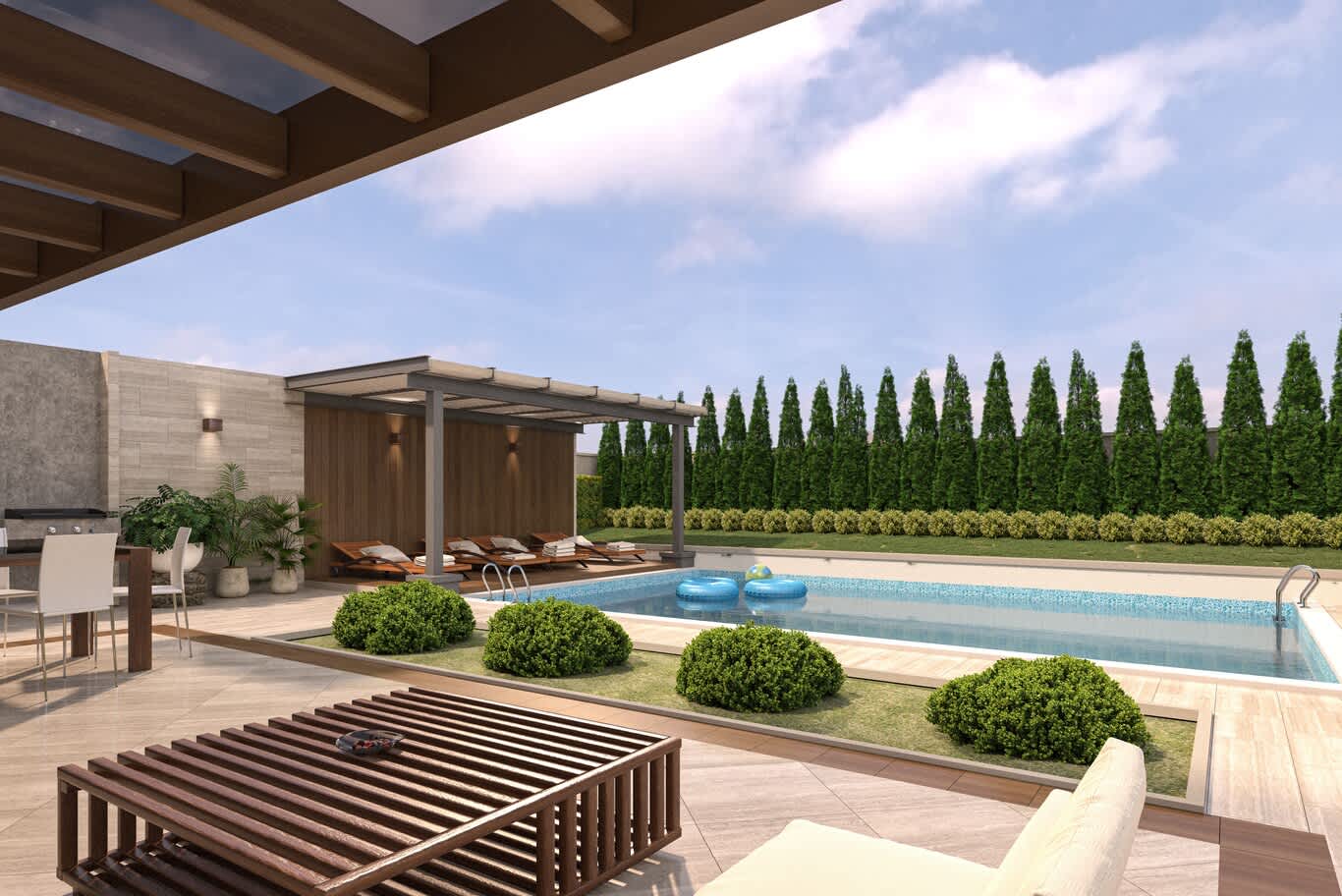 Garden planting with columnar cypress hedge and clipped shrubs beside a pool