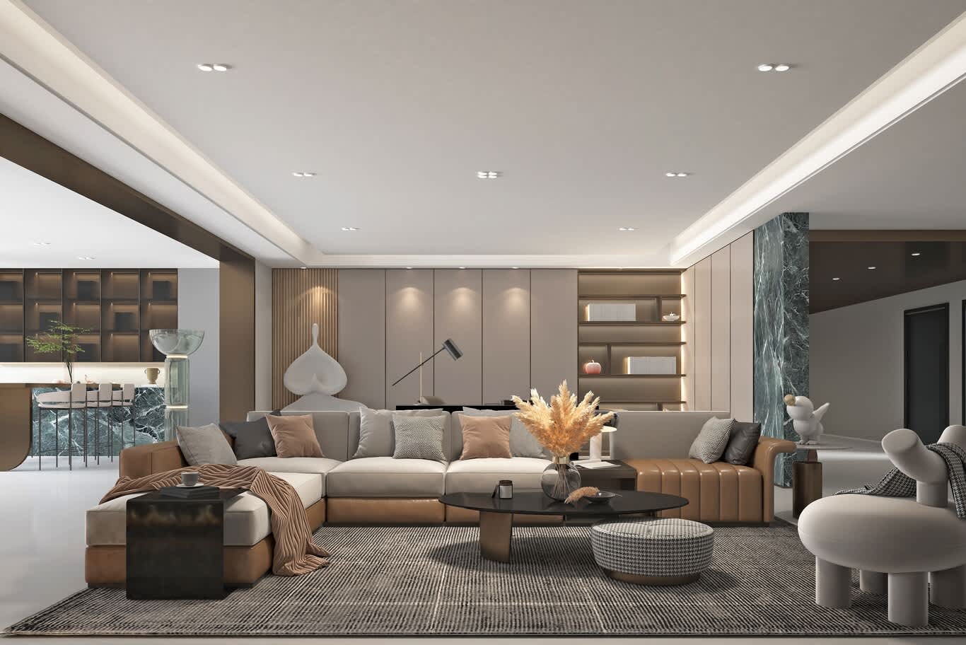 False ceiling design in Downtown Dubai – cove-lit living room with leather sectional and verde marble column