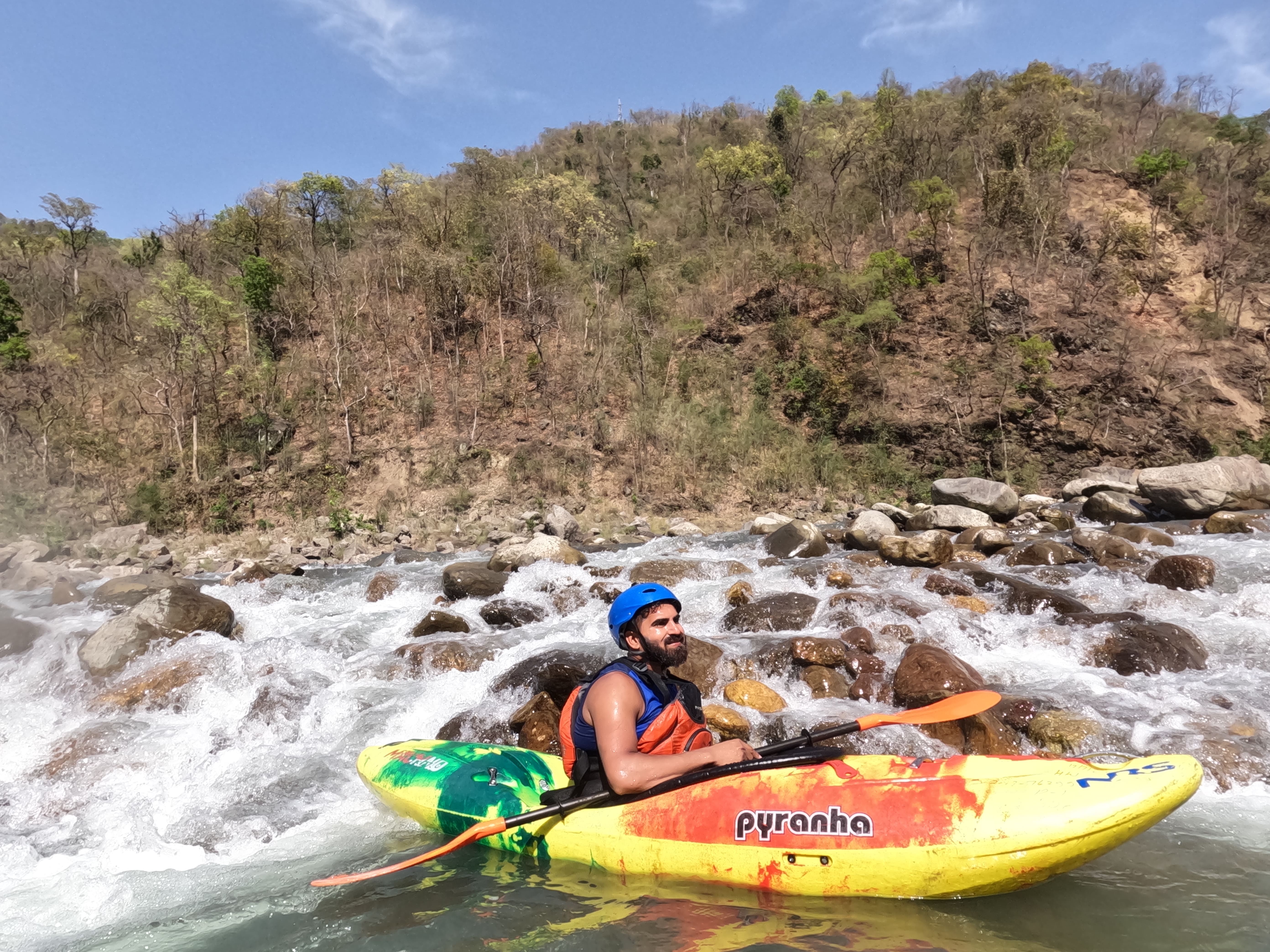 Kayaker performing an eddy turn