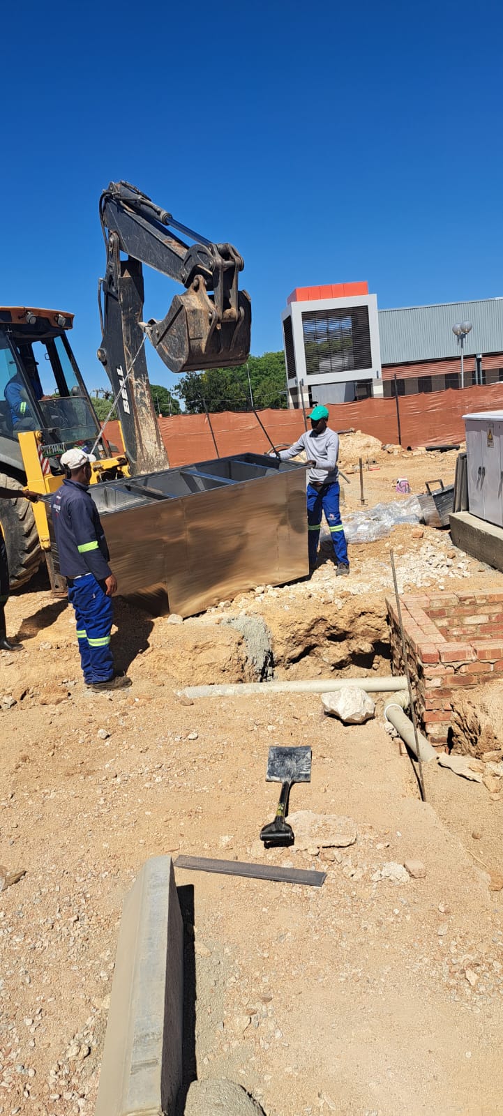 A satisfied customer shaking hands with a plumber