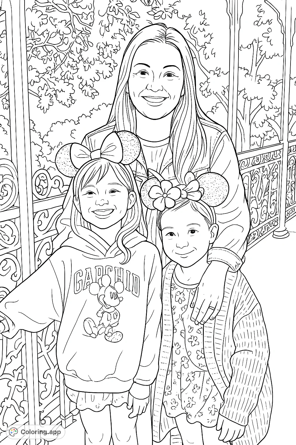 A heartwarming family portrait featuring a woman and two smiling girls wearing character ears, set against an ornate park railing. A joyful scene.