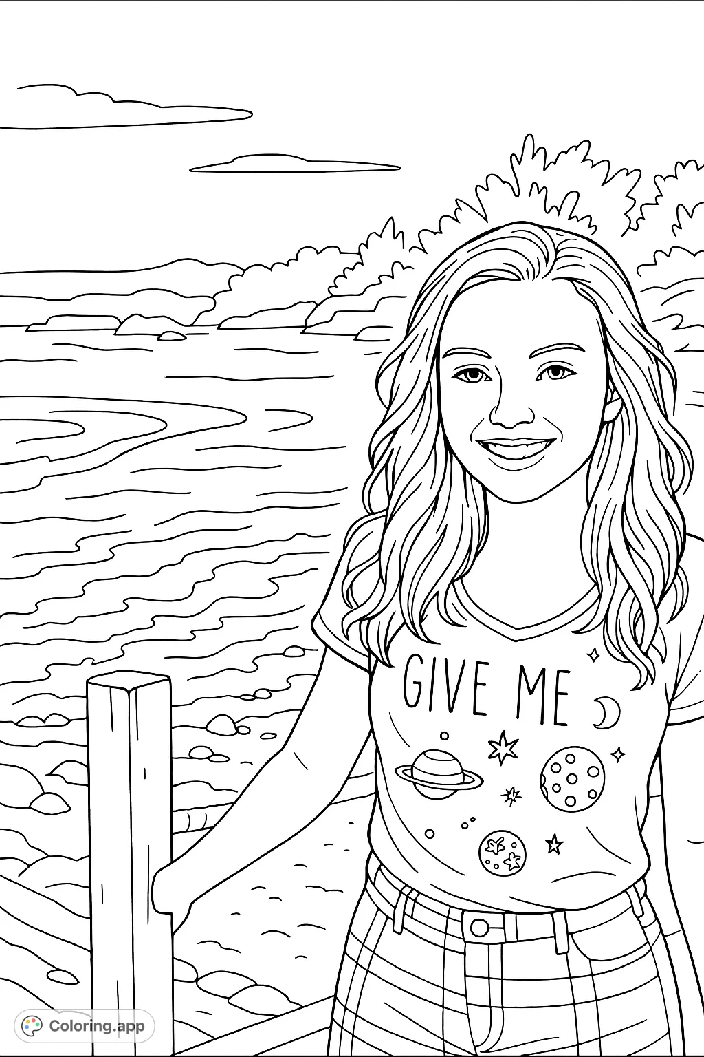 A cheerful girl with a space-themed shirt stands by a coastal path, smiling brightly as the serene beach and expansive ocean unfold in the distance. Perfect for relaxation!