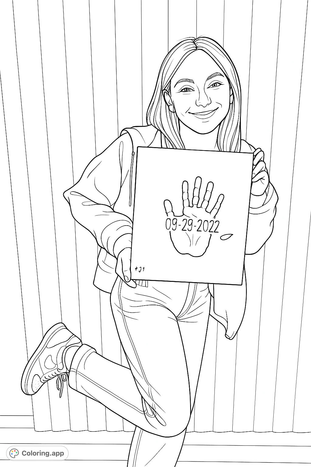 A smiling young woman proudly displays a canvas featuring a layered handprint and a special date, celebrating a cherished memory through art.