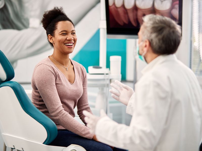 Young girl receiving dental care through a non-profit loan