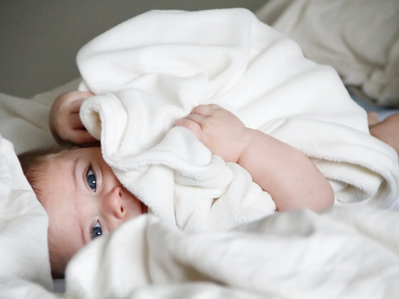 baby wrapped in blanket