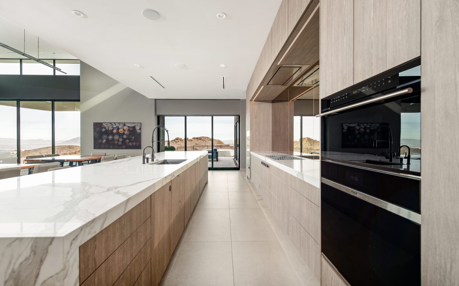 Long kitchen run with integrated appliances