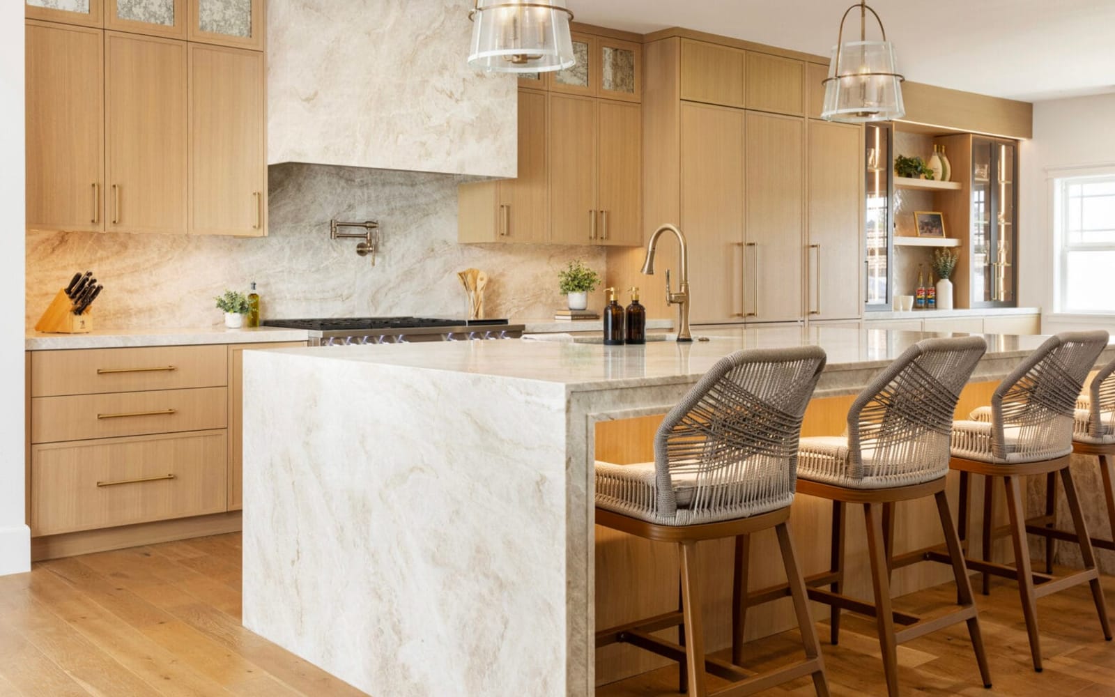 Finished oak kitchen with island and pendants