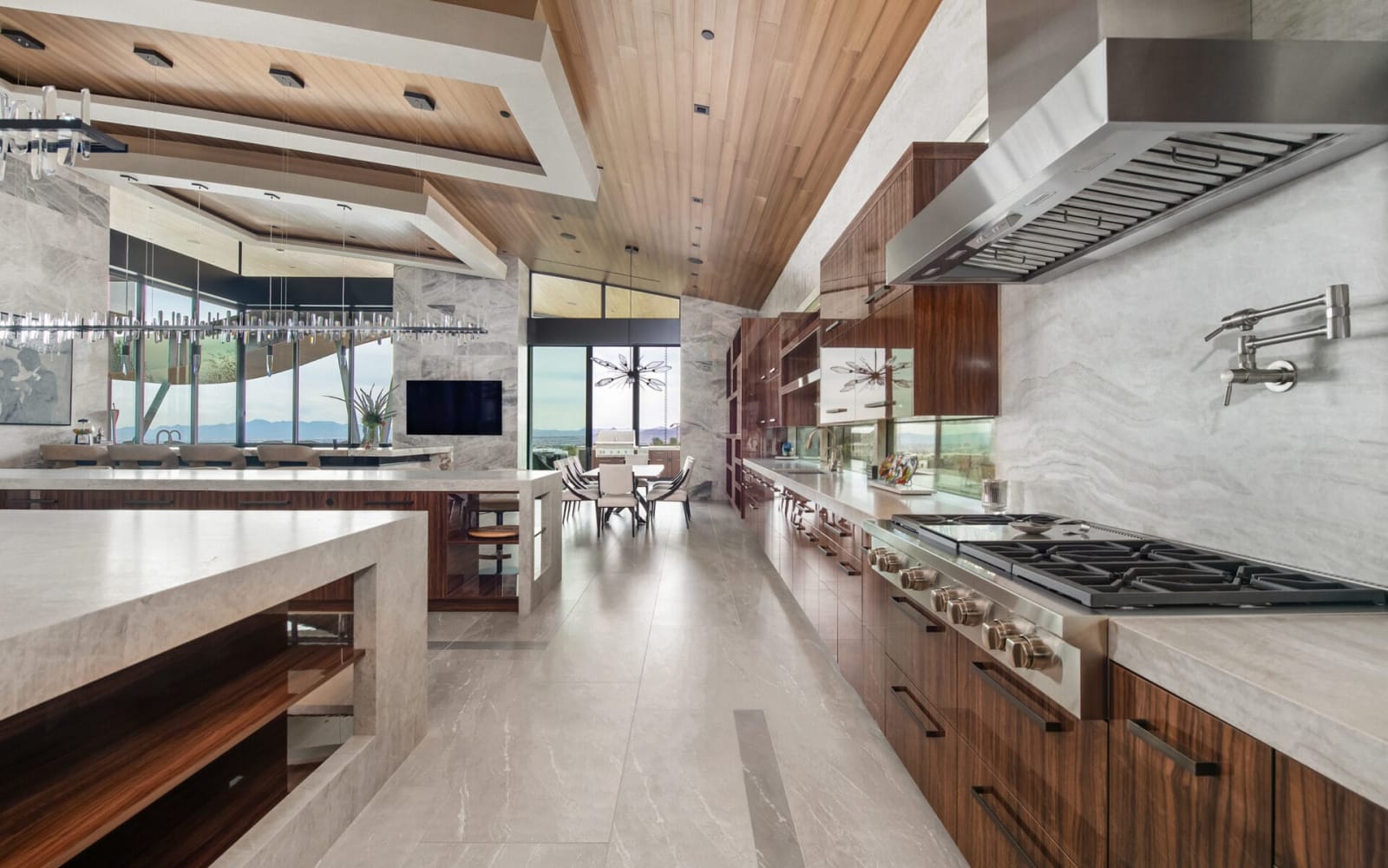 Walnut kitchen with island and open shelving
