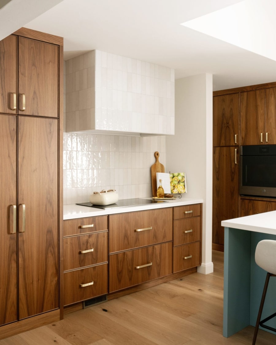 Two-tone kitchen with walnut uppers and painted lowers