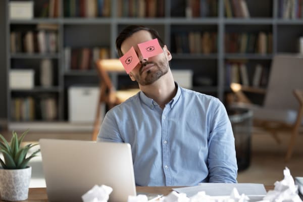 man switching off during workplace pressuers