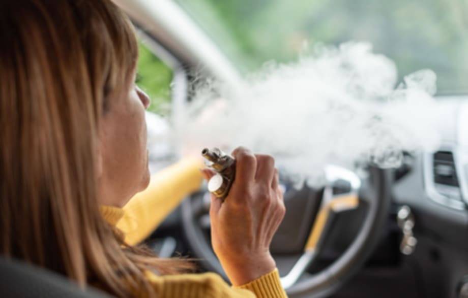 Woman vaping while driving