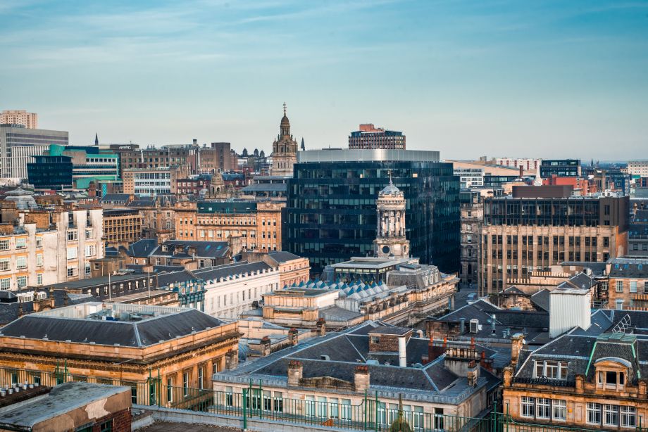 Rooftop view of buildings and city skyline in Glasgow, Scotland
