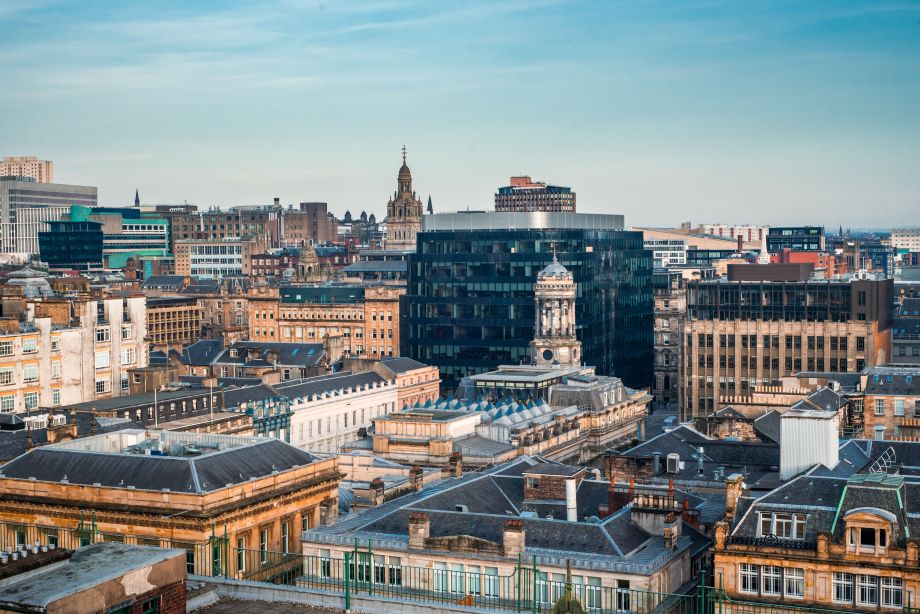 Rooftop view of buildings and city skyline in Glasgow, Scotland