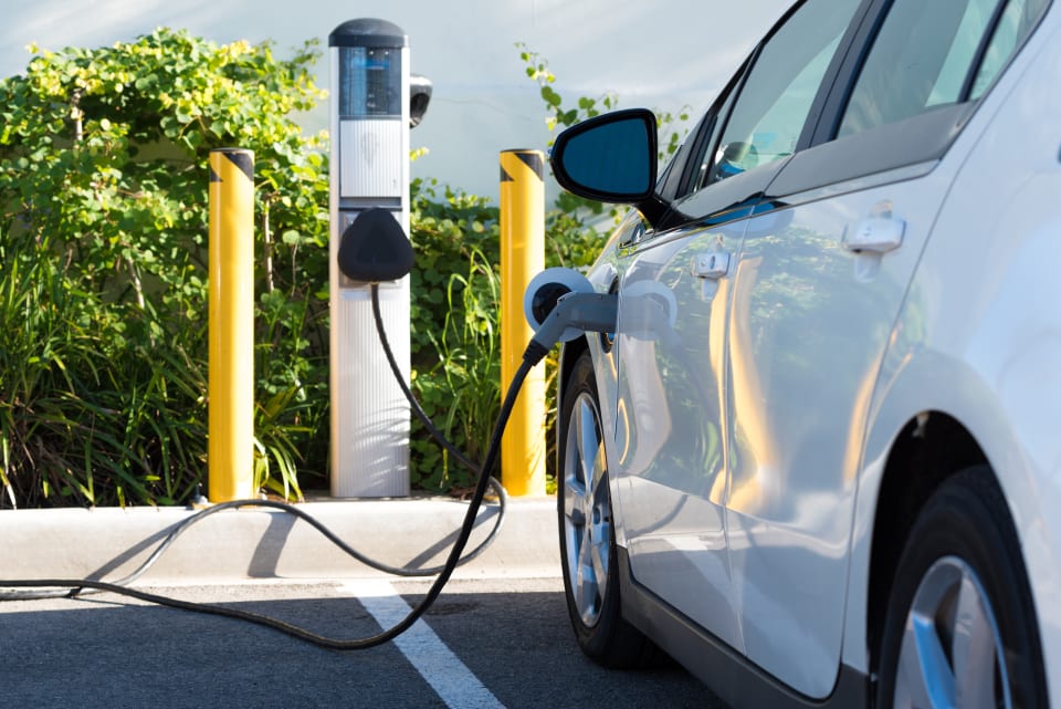 An electric charger station attached to an EV