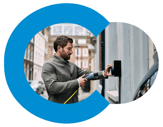 Man using EV charging point