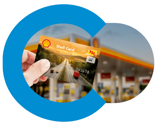 Driver holding a Shell multi network card at a Shell station in the UK