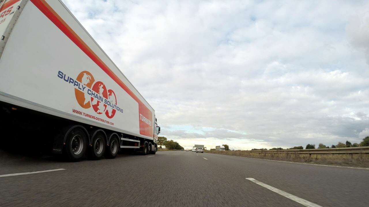 A distribution HGV driving on a motorway