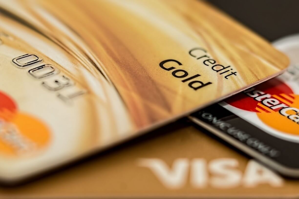 A close up of a Gold credit card