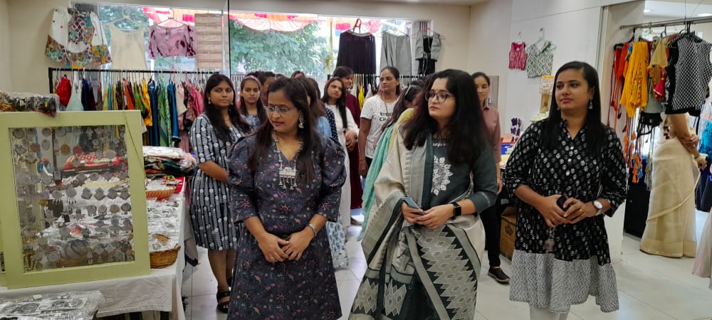 Visitors Exploring Exhibition Stalls