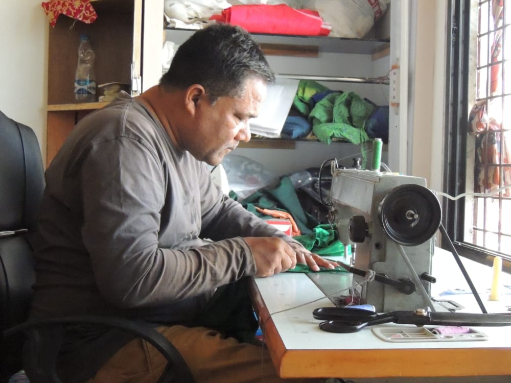 Tailor at Work – Sewing Machine
