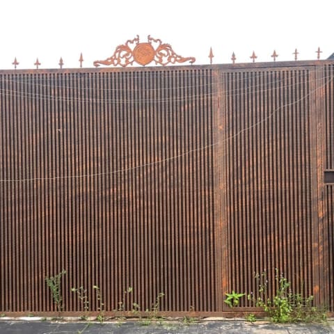 Heavy-Duty Vertical Bar Sliding Gate with Ornamental Crest