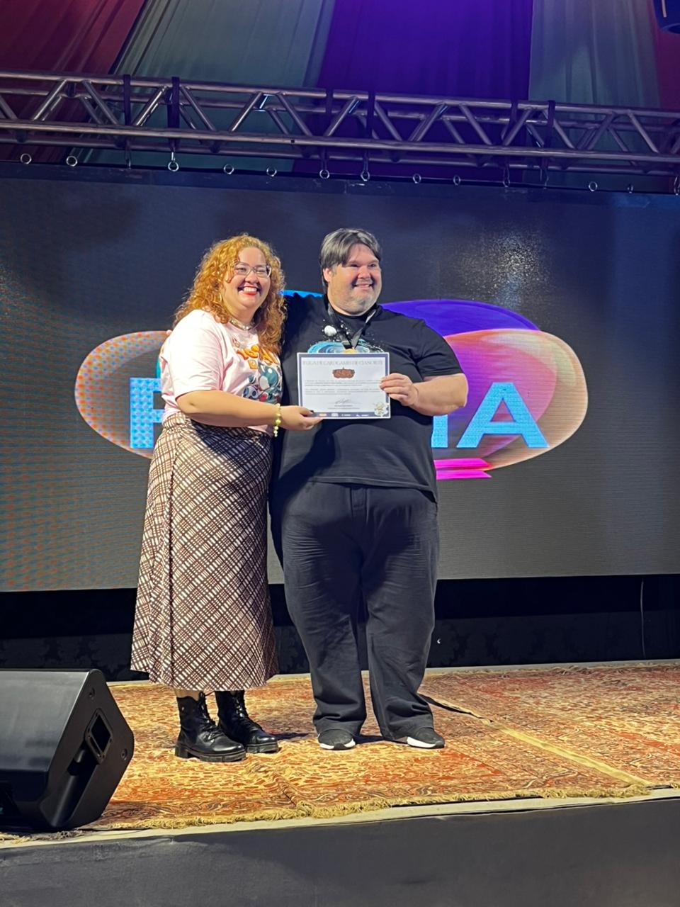 Momento de premiação da comunidade Cianorte Card Masters na Flicia 2026