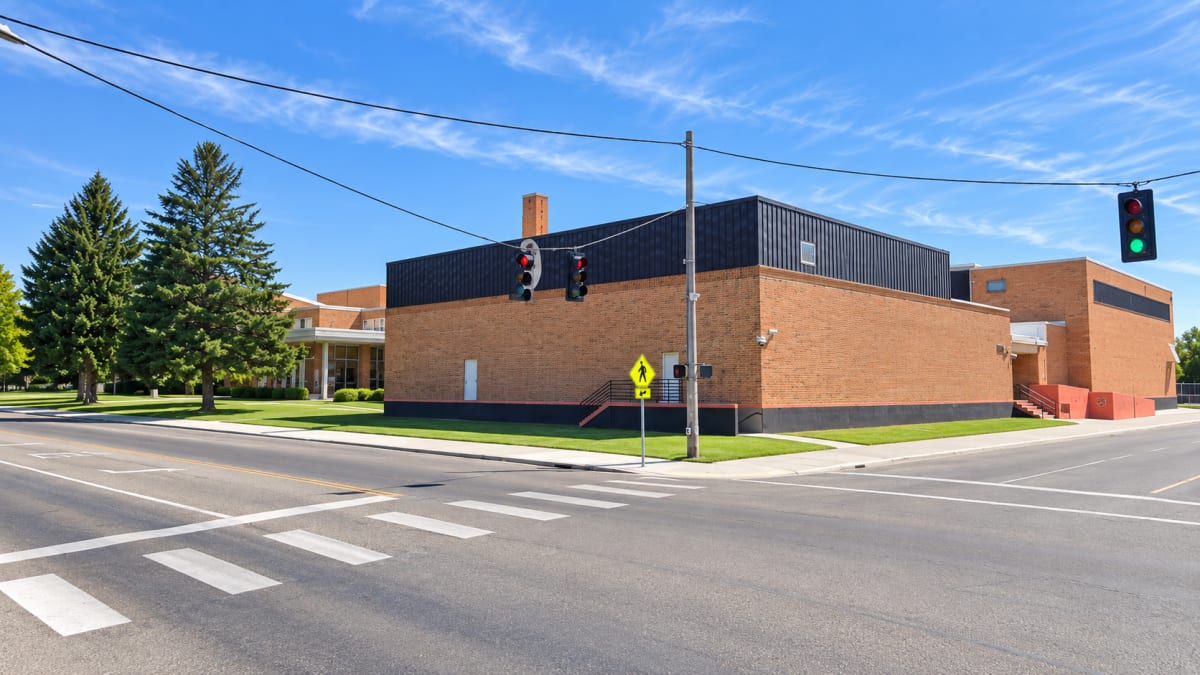 Idaho Falls high school exterior with no readable signs or student faces