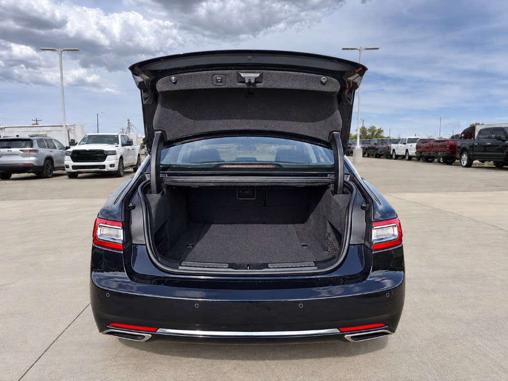 Open sedan trunk at a Wareing Motors used vehicle lot