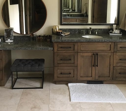 Natural wood finish custom bathroom vanity by Gem State Cabinets