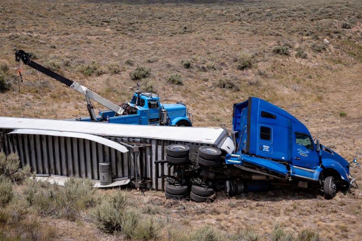 Semi-truck after an accident in a field near Idaho Falls