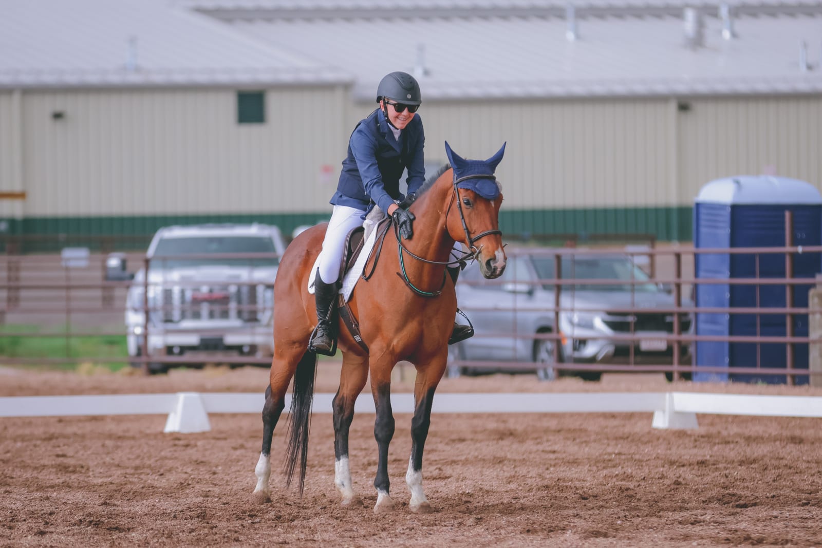 Mavis and Helen Hand at the halt in the dressage arena