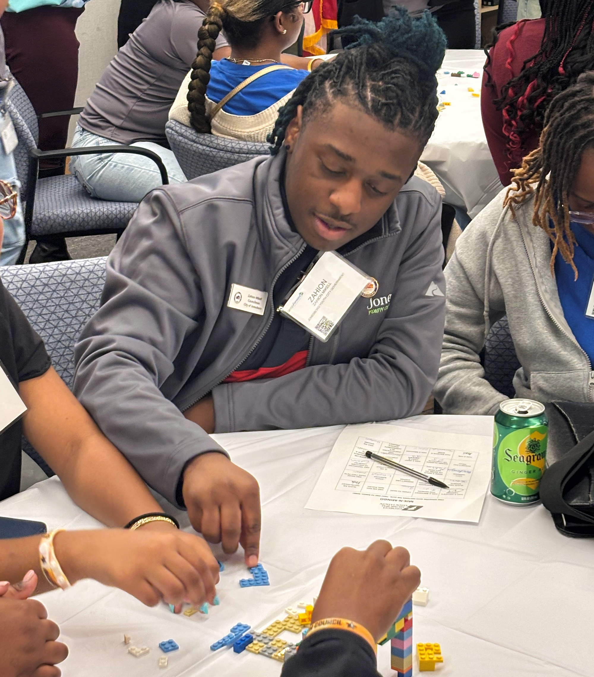 Youth council members participate in an table exercise during the 2025 Youth Forum held in Atlanta.