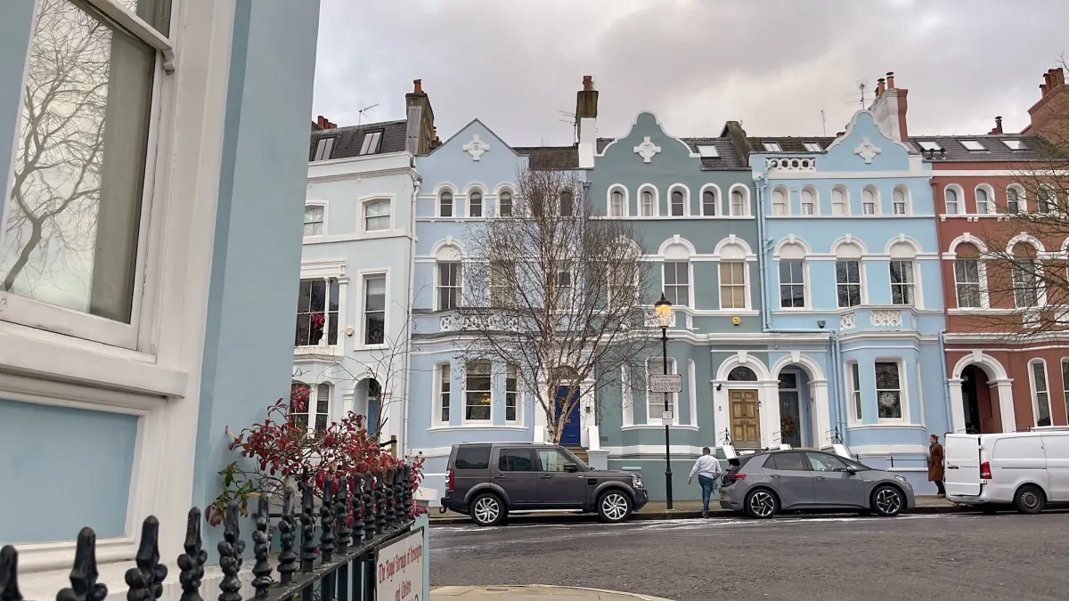 colorful pastel townhouses on Lansdowne Road Notting Hill London near Six Senses