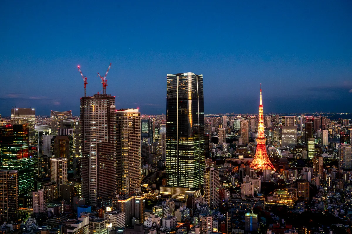 Tokyo skyline at night with Tokyo Tower illuminated Park Hyatt Tokyo Shinjuku