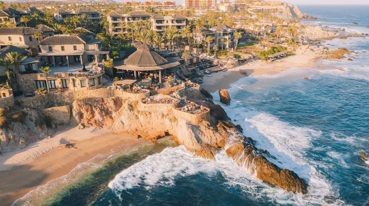 Aerial view of Esperanza Auberge resort cliffside casitas and Cocina del Mar restaurant Cabo San Lucas