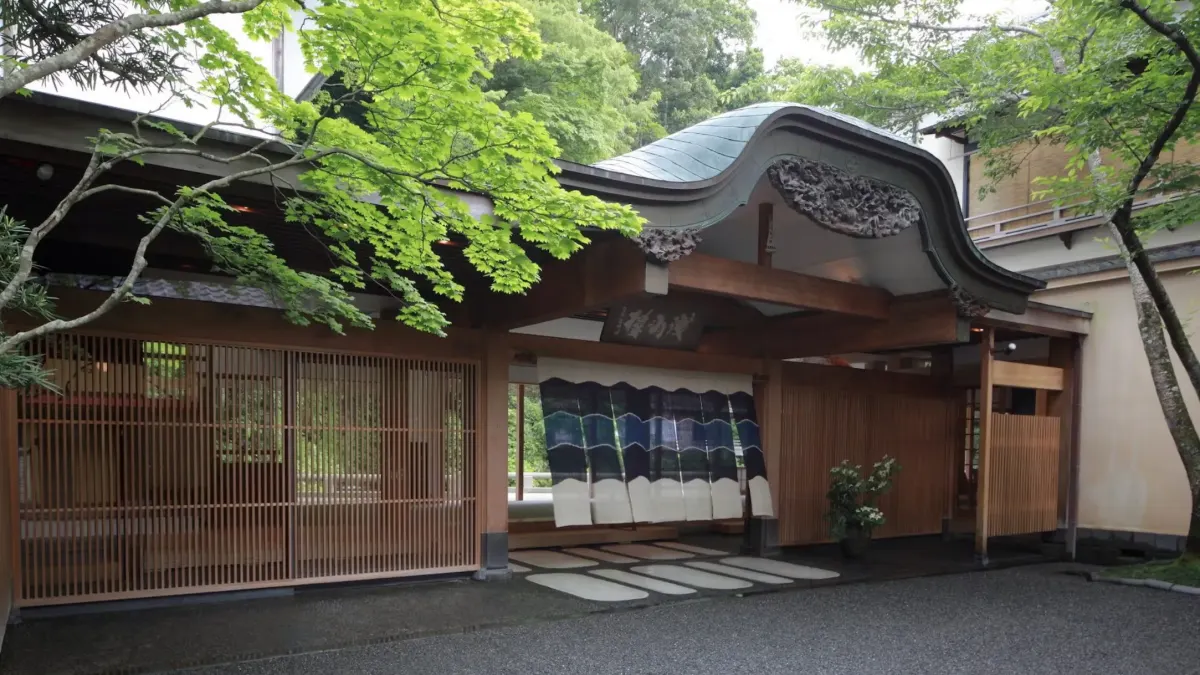 Asaba ryokan entrance with noren curtain in Shuzenji — oldest luxury onsen ryokan in Japan
